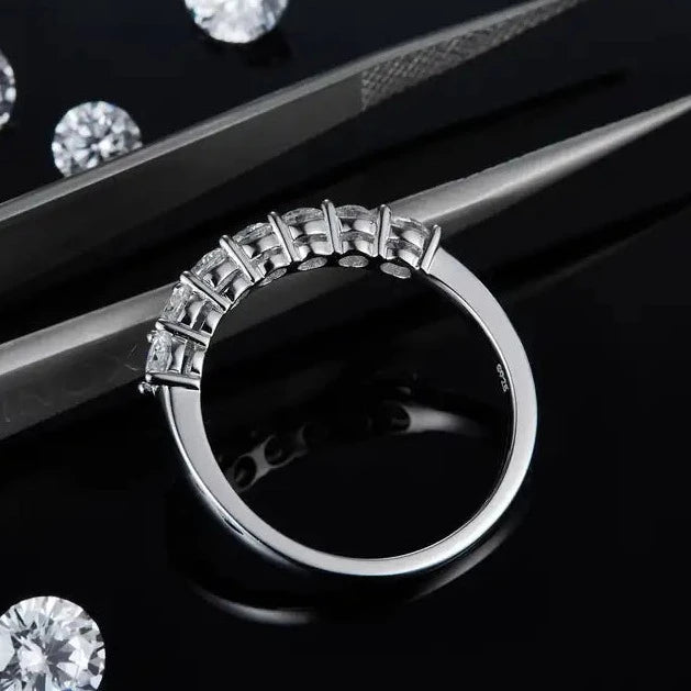 A timeless and elegant design, this wedding band set features a half-eternity row of seven stones set in 9ct white gold.