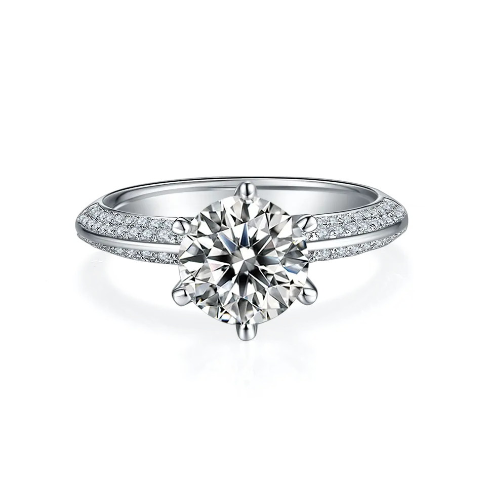 This engagement ring features a brilliant 2.00ct moissanite center stone and a band adorned with pave-set moissanites for extra brilliance.