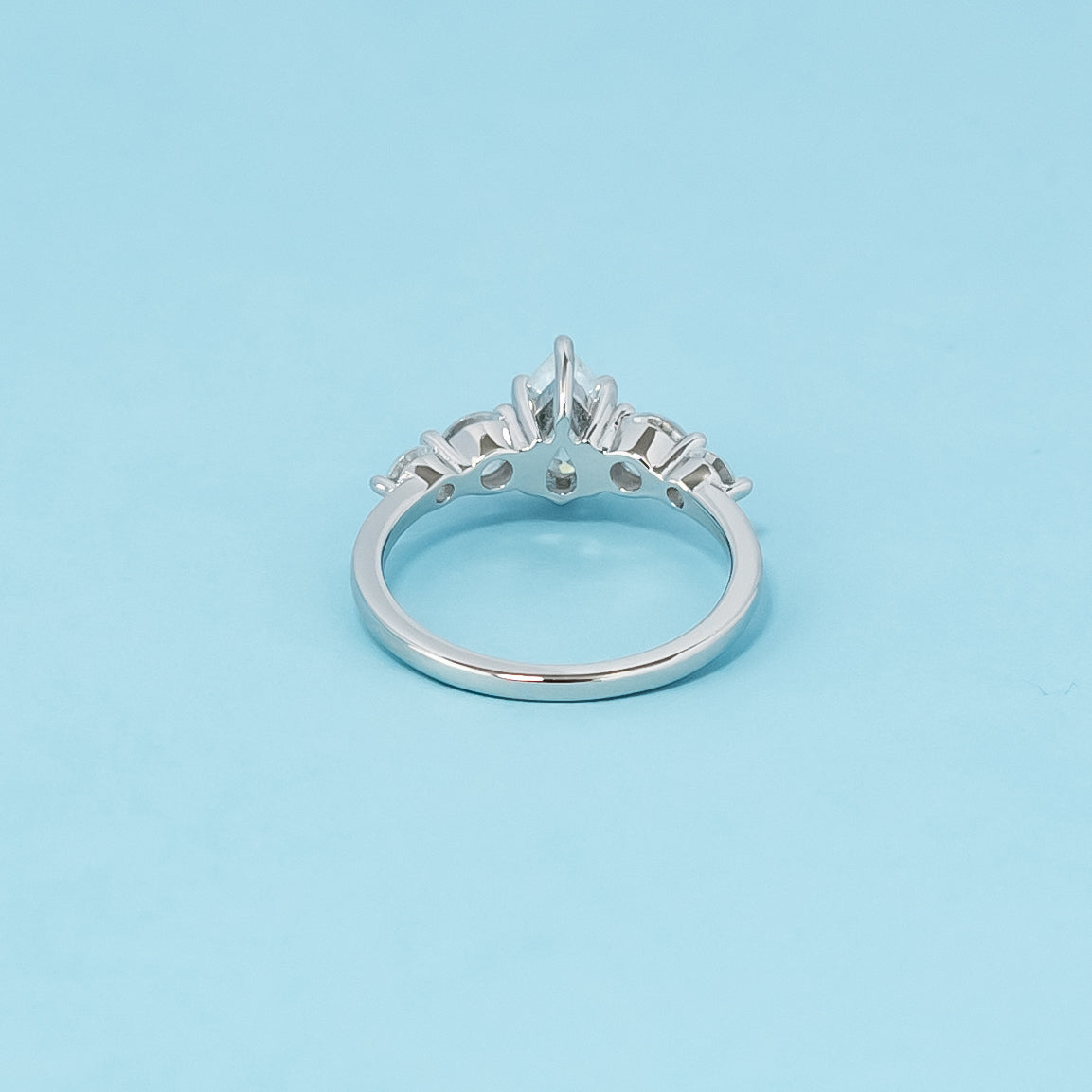 Luxurious 9ct white gold engagement ring featuring five beautiful pear-shaped moissanites, symbolizing enduring love and commitment.