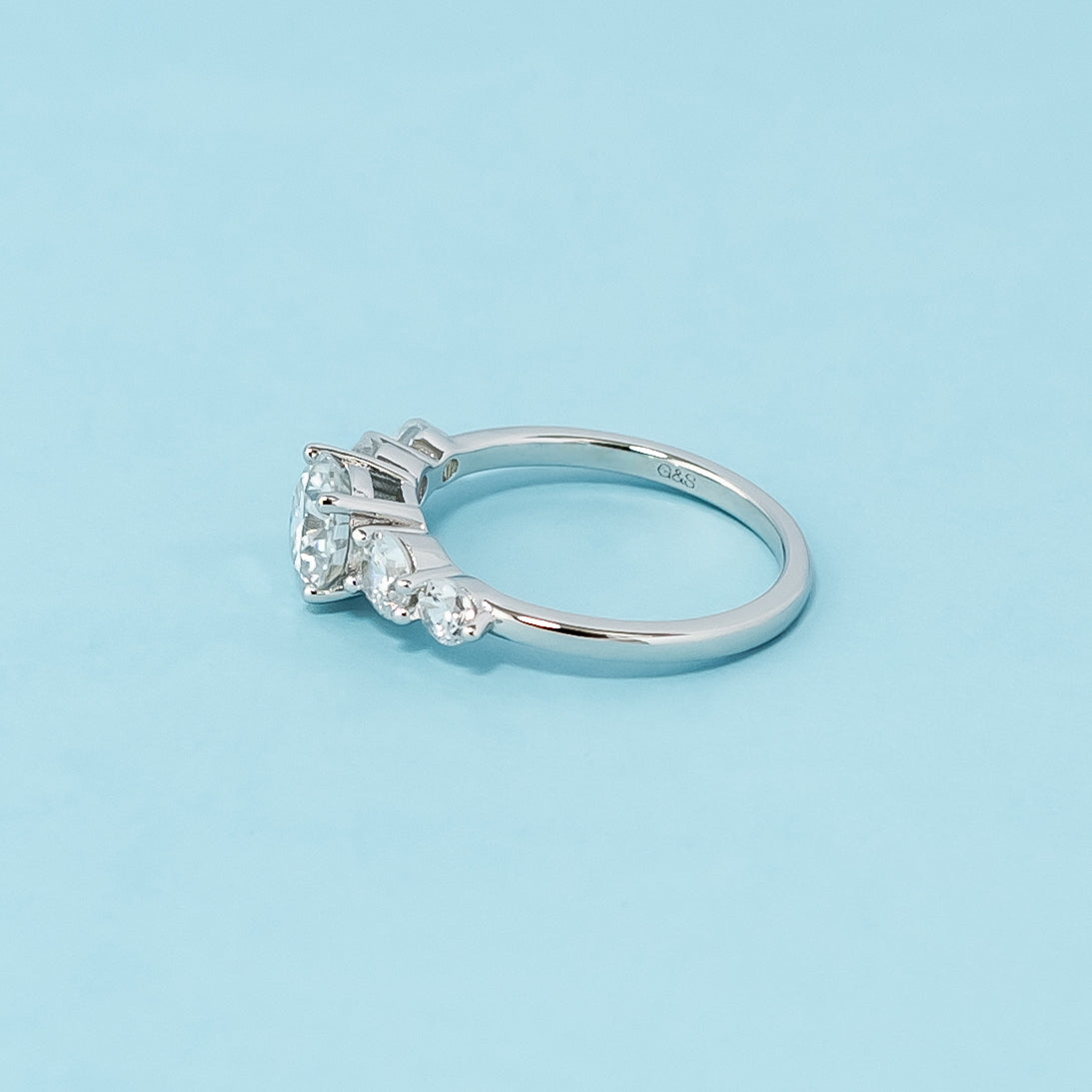 Stunning five-stone engagement ring showcasing the ultimate brilliance and fire of round brilliant moissanites, crafted in 9ct white gold.