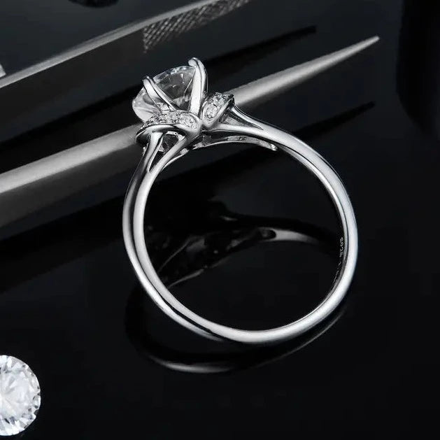 This sterling silver engagement ring features a radiant 1.00ct moissanite, designed to capture light and attention.