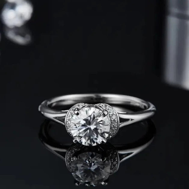 A refined sterling silver engagement ring with a beautifully cut 1.00ct moissanite, offering exceptional sparkle and shine.