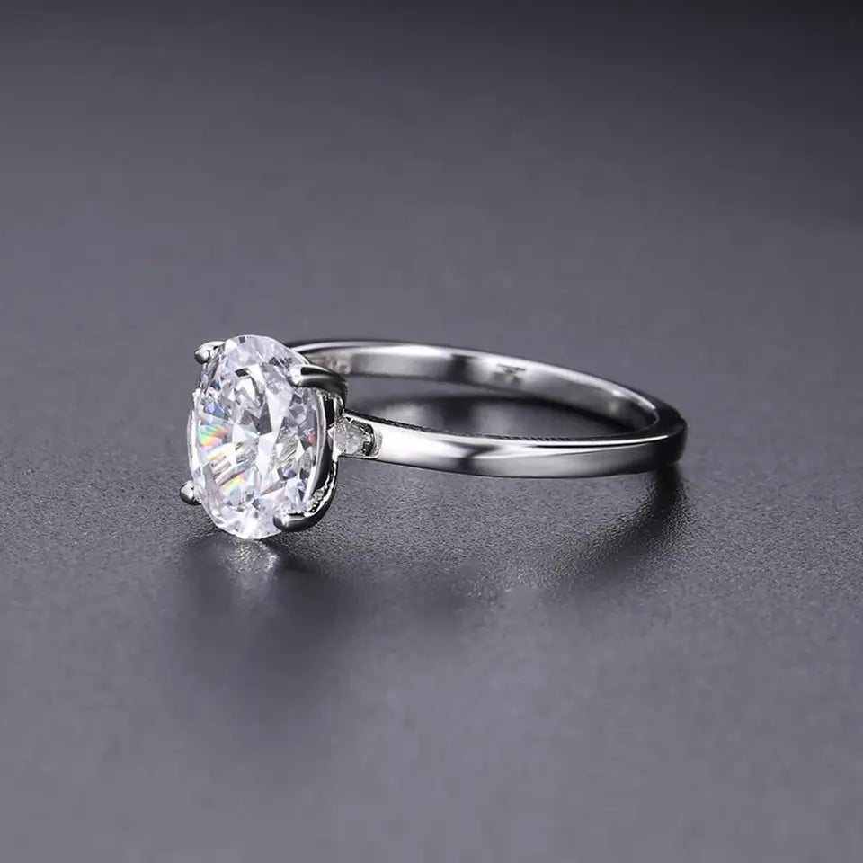 Aletté Winckler - Classic 4 Claw Oval Solitaire 3.00ct Moissanite Engagement Ring Set in Sterling Silver