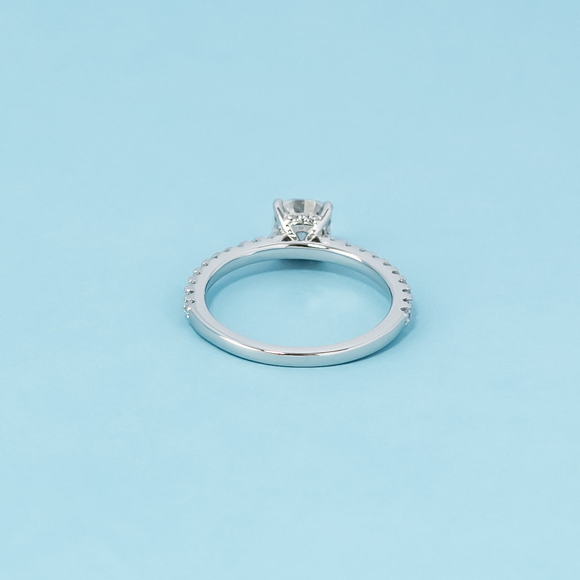 Luxurious 9ct white gold engagement ring with a discreet setting that highlights the beauty and brilliance of the cushion cut moissanite.
