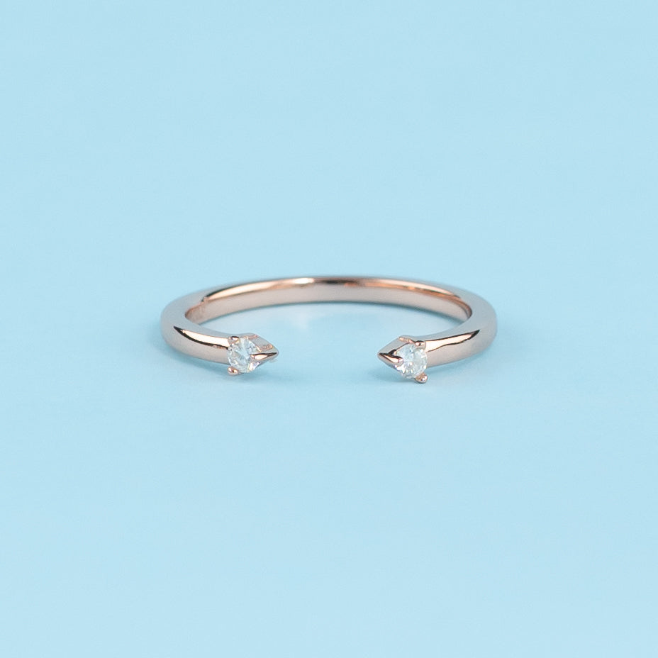 Elegant 9ct rose gold wedding band set featuring sparkling moissanites, symbolizing infinite love.