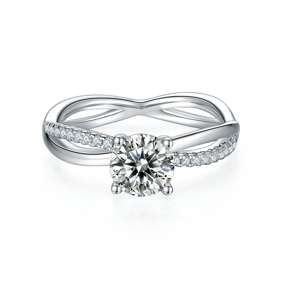 Showcasing a brilliant 1.00ct moissanite set in a polished sterling silver band with an elegant infinity twist detail.