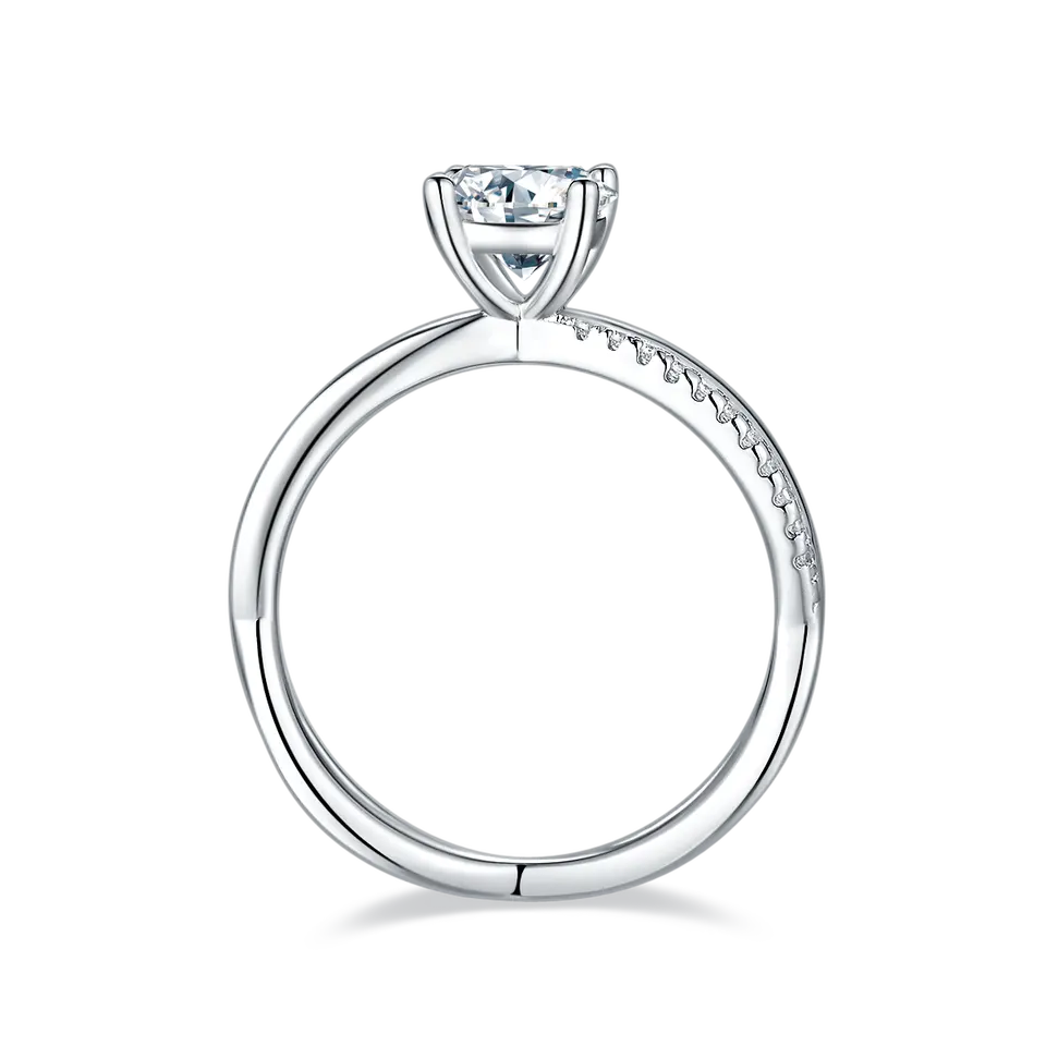 This engagement ring features a sparkling 1.00ct moissanite and a band that gracefully forms the infinity symbol, crafted in sterling silver.