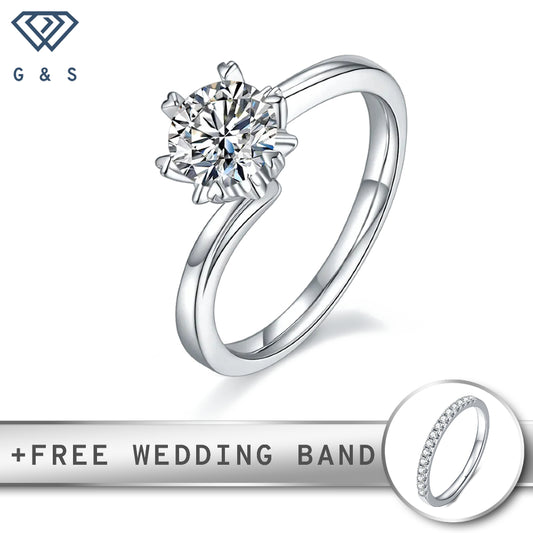 A delicate sterling silver engagement ring featuring a 1.00ct moissanite held by six claws, reminiscent of a snowflake.