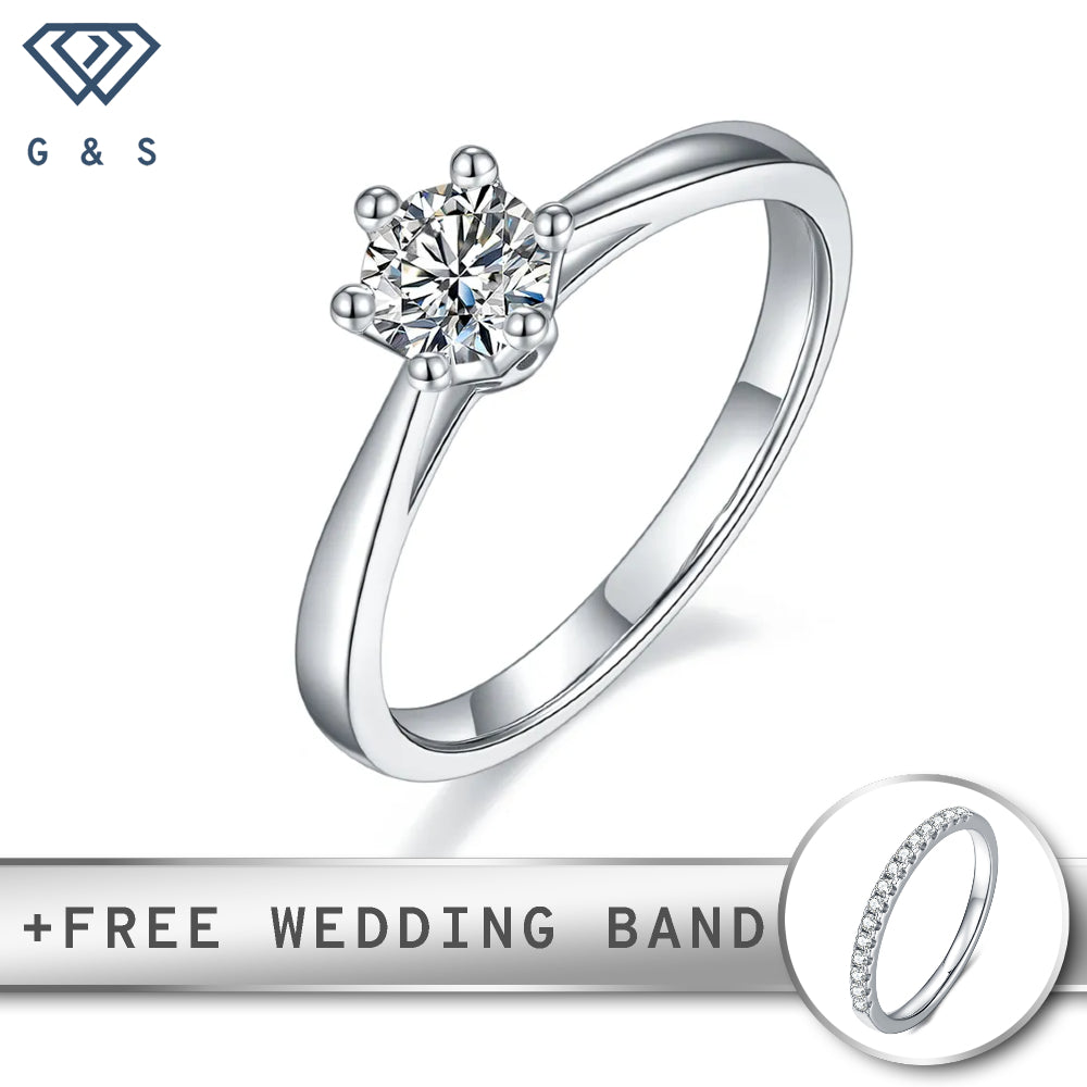 A classic 6-claw solitaire engagement ring with a 0.50ct moissanite, featuring a unique floral basket setting, crafted in sterling silver.