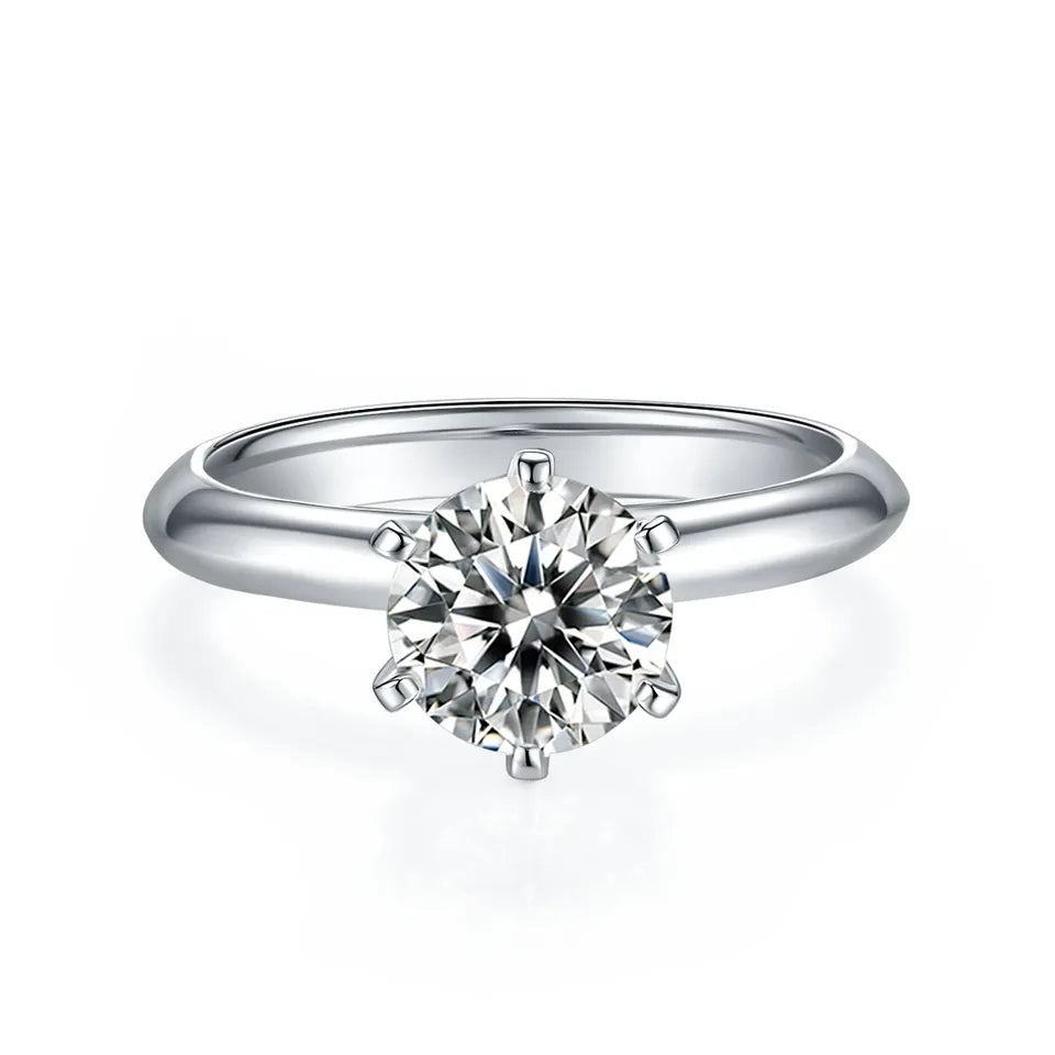 A beautiful solitaire engagement ring with a sparkling 1.50ct moissanite held securely in a traditional 6-prong Tiffany setting.