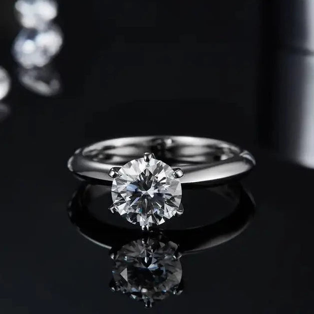 An elegant and sophisticated sterling silver engagement ring with a 1.50ct moissanite held securely by a classic 6 prong setting.