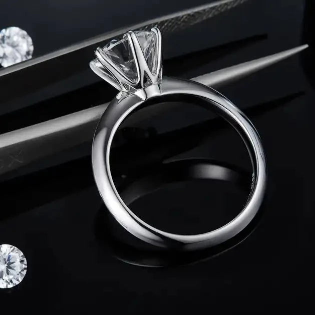 A beautiful engagement ring featuring a 2.00ct moissanite in a classic Tiffany-inspired 6-prong setting, made with durable sterling silver.