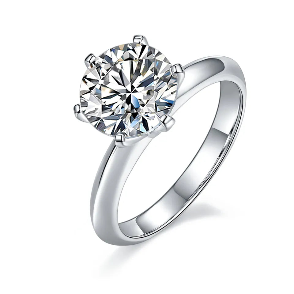 A stunning 3.00ct moissanite takes center stage in this elegant 6-claw Tiffany setting.