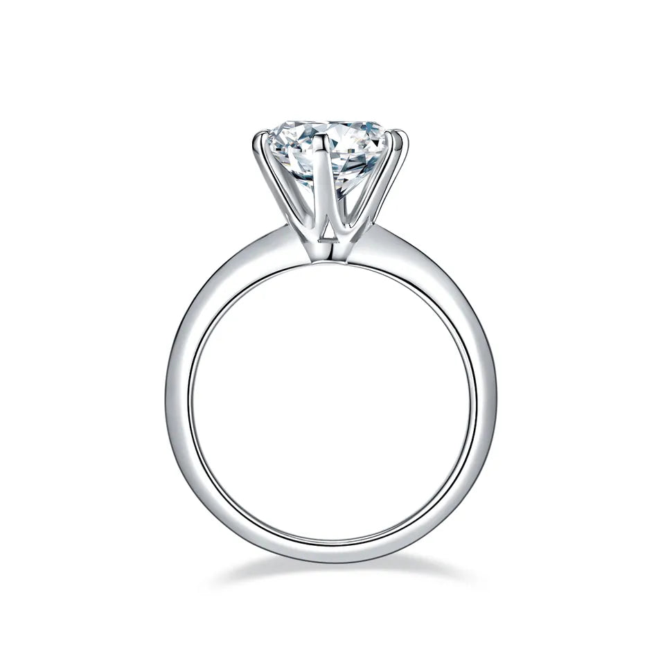 This 3.00ct moissanite engagement ring showcases a classic 6-prong Tiffany setting on a 9ct white gold band.