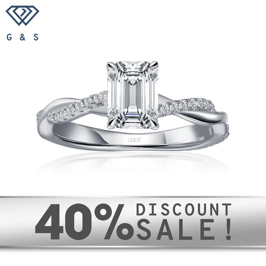 Timeless Infinity emerald cut moissanite engagement ring set in 9ct white gold.