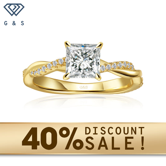 A 9ct yellow gold engagement ring with a unique infinity design and a sparkling princess cut moissanite.