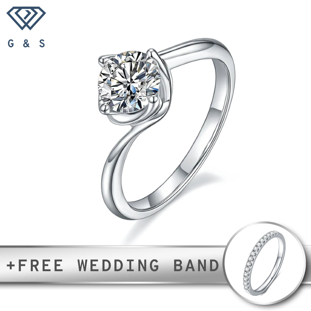 A classic and elegant engagement ring featuring a brilliant 1.00ct moissanite held in a unique twist basket setting, crafted in polished sterling silver.