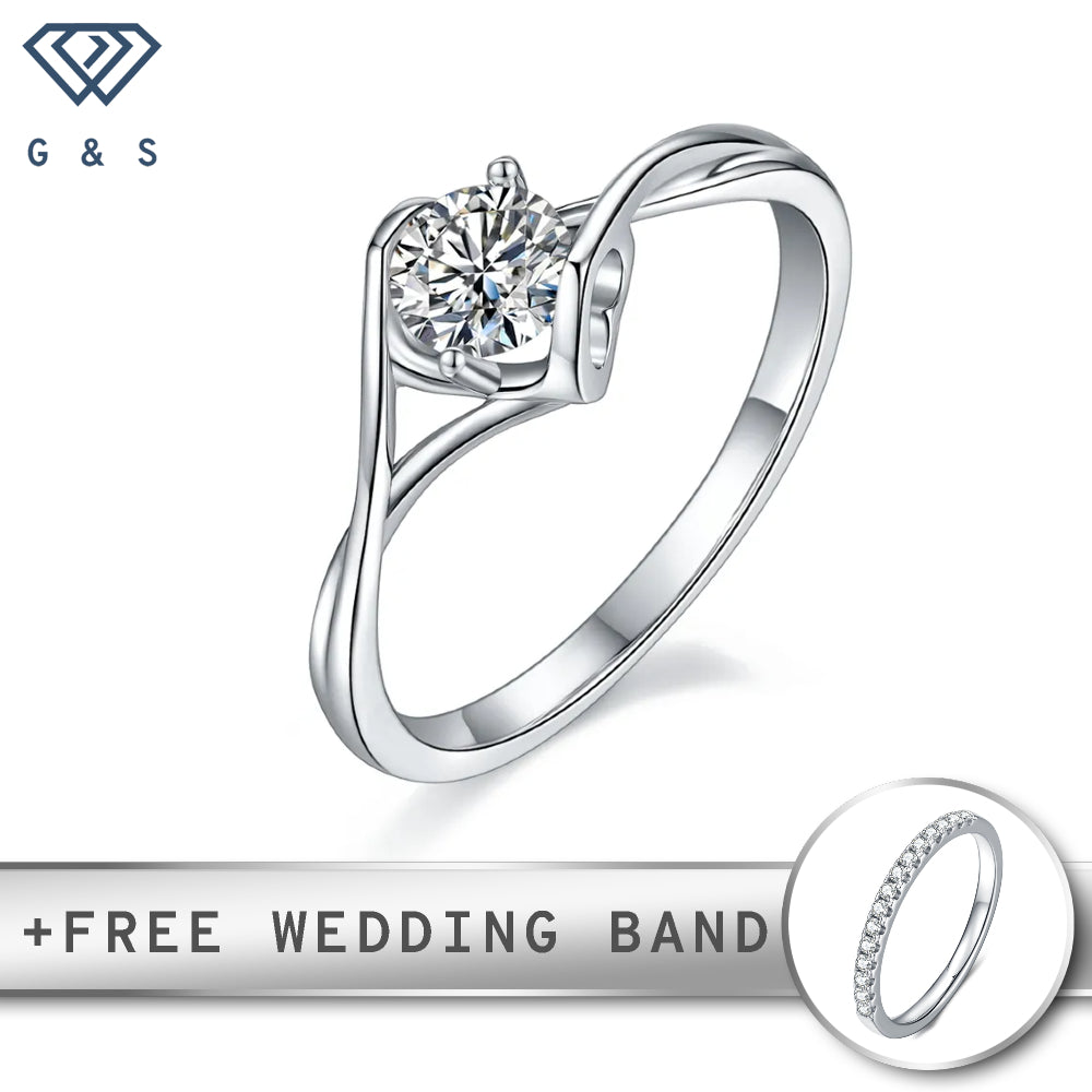 A unique engagement ring featuring a 0.50ct moissanite held securely by a delicate two-heart design, crafted in classic sterling silver.