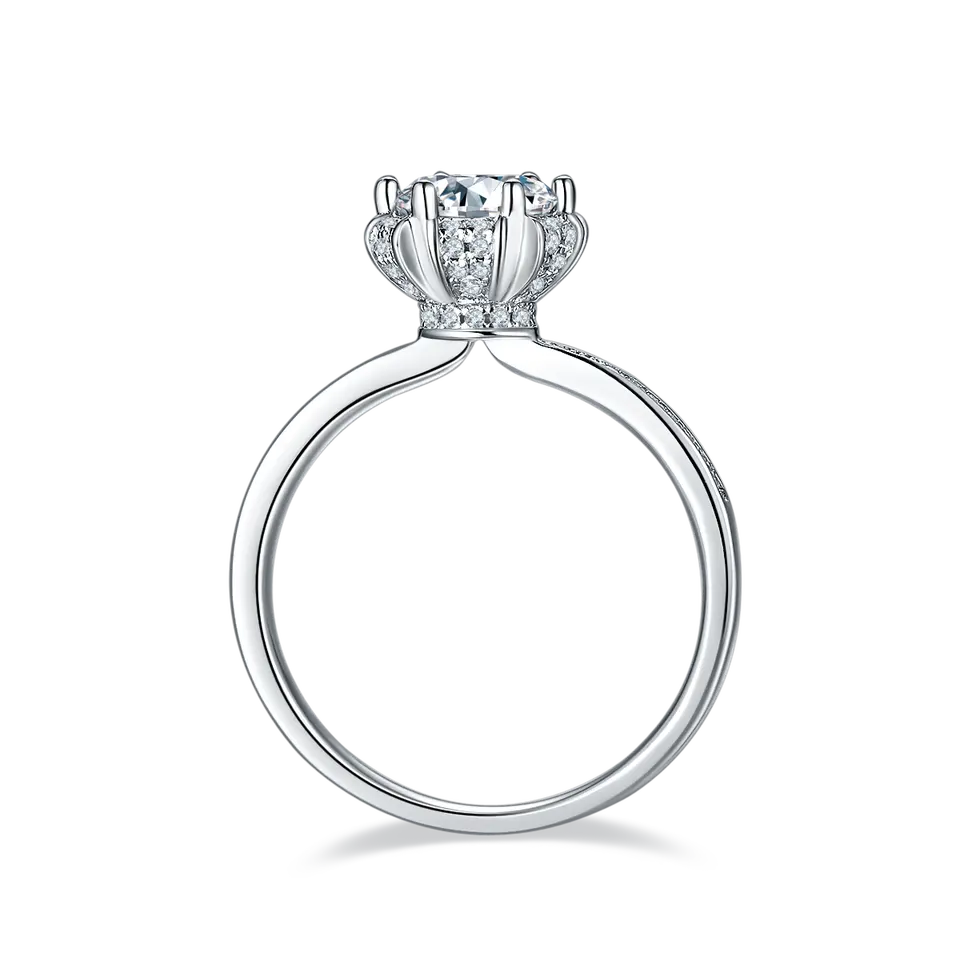 A beautiful sterling silver engagement ring with a 1.00ct moissanite center stone and a vintage-style pave setting for added sparkle.