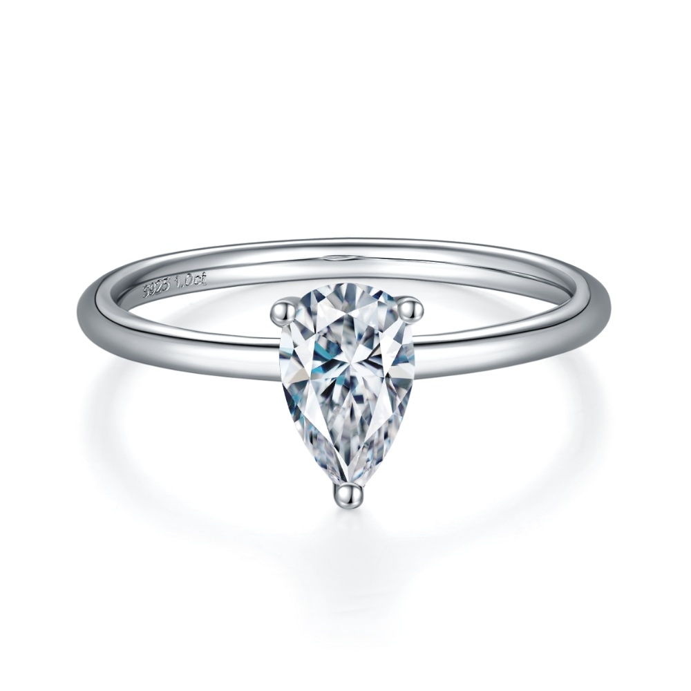 This timeless engagement ring features a brilliant 1.00ct pear-shaped moissanite held securely by classic prongs.