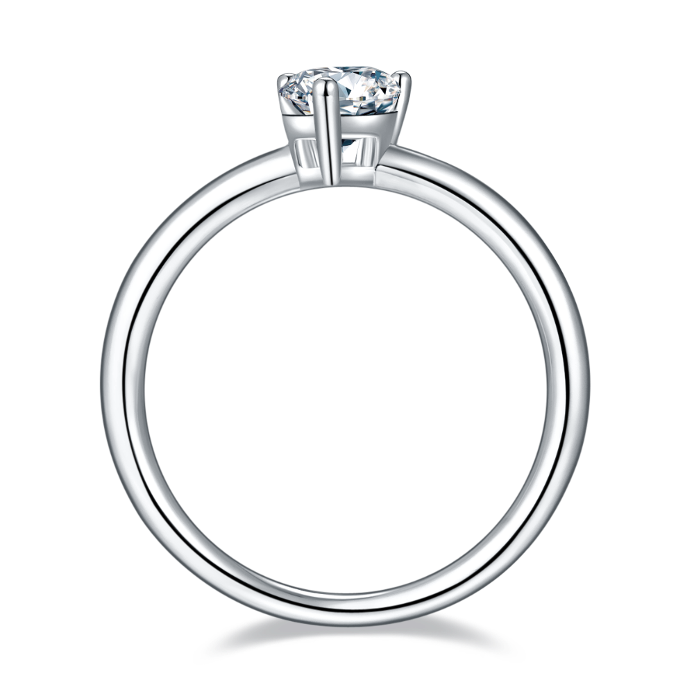 A stunning pear-cut moissanite takes center stage in this minimalist sterling silver setting.