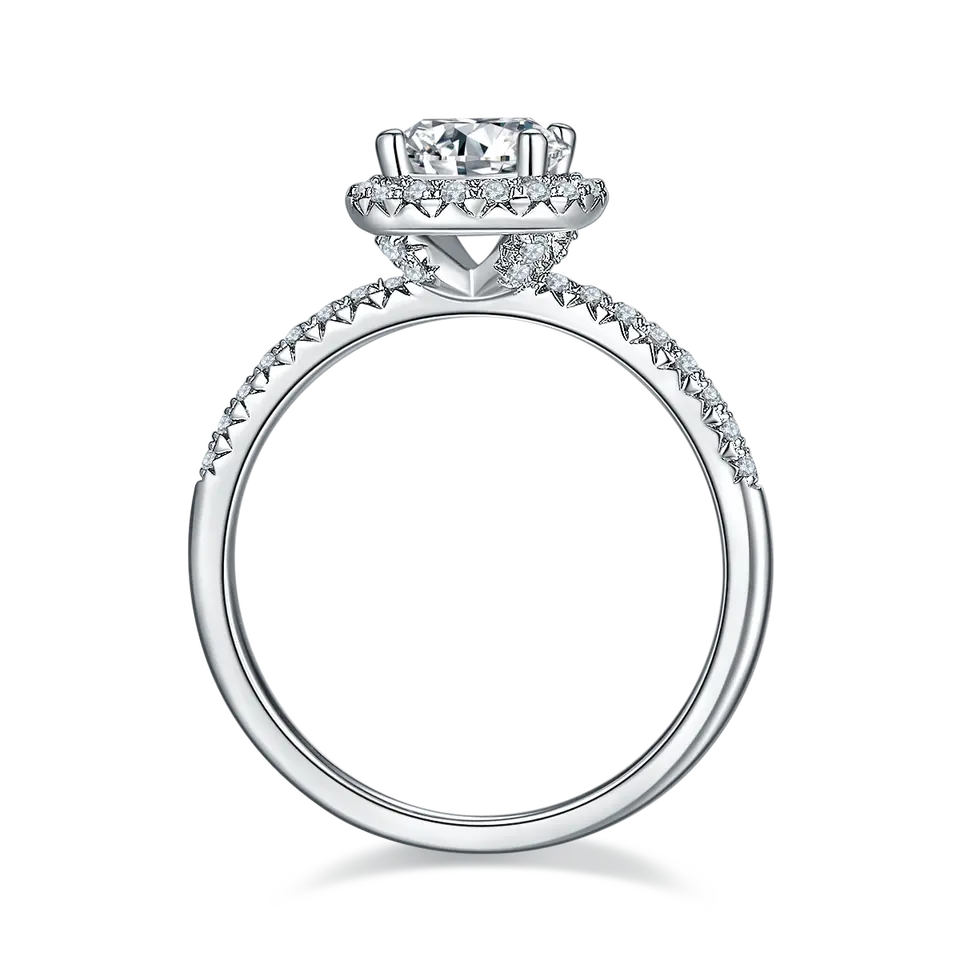 A stunning engagement ring featuring a 1.00ct moissanite center stone and a delicate halo of smaller stones.