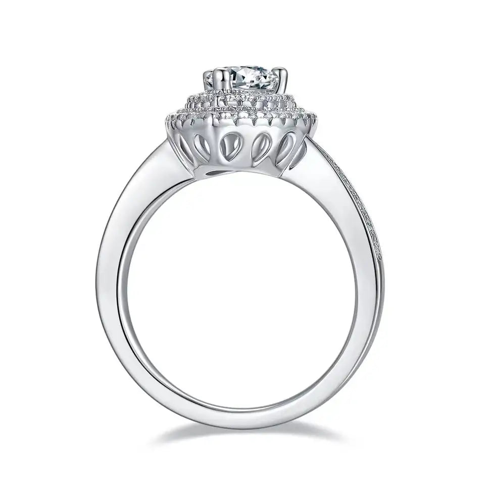 A detailed shot of the double halo design, highlighting the intricate setting and the pear-shaped moissanite.