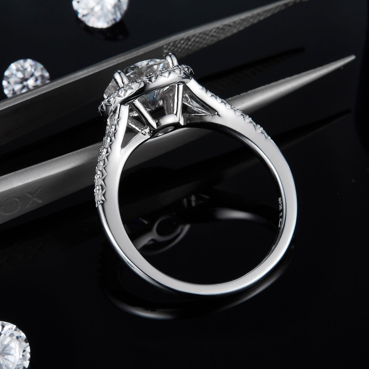 A side profile showing the height and design of the 2.00ct moissanite halo setting.