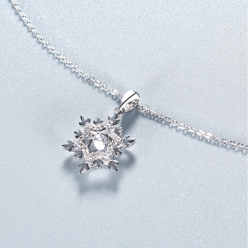Snowflake Dancing Moissanite Pendant Set in Sterling Silver