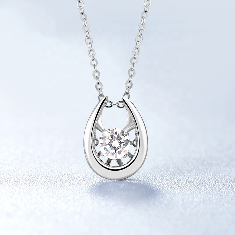Classic Dancing Moissanite Pendant Set in Sterling Silver