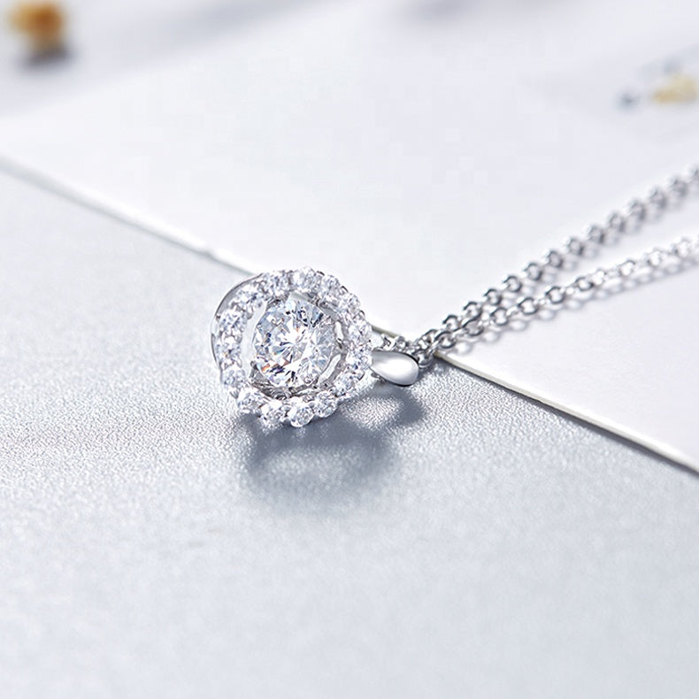 Halo Dancing Moissanite Pendant Set in Sterling Silver