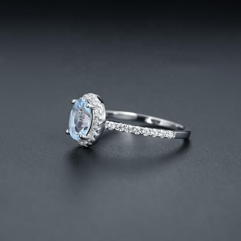 Classic Blue Topaz Halo Ring - Oval Cut