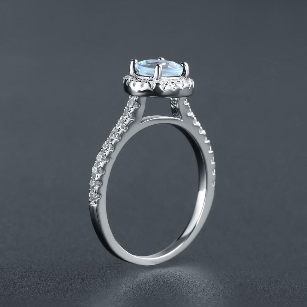 Classic Blue Topaz Halo Ring - Oval Cut