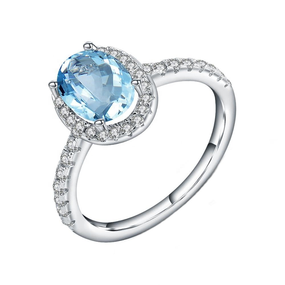 Classic Blue Topaz Halo Ring - Oval Cut