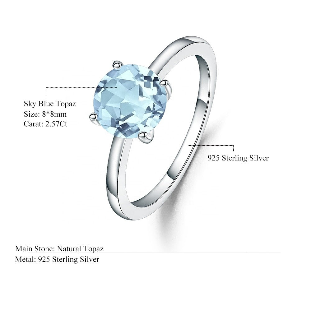 Classic 4 Claw Blue Topaz Solitaire Ring