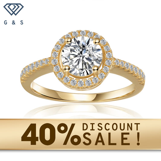 A 1.00ct moissanite sparkles within a heart-shaped halo in this 9ct yellow gold engagement ring.
