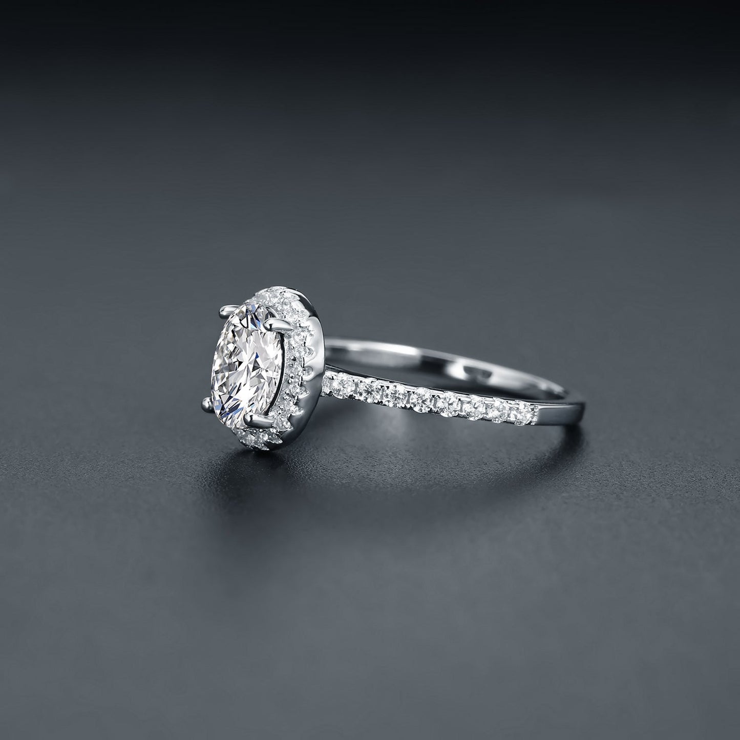 A classic and sophisticated design showcasing a 1.00ct oval moissanite with a sparkling halo.