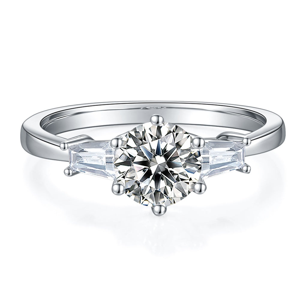 This elegant engagement ring showcases three sparkling moissanite stones totaling 1.00ct, set in a polished sterling silver band.