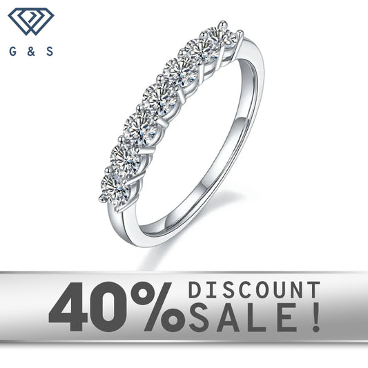 A classic and elegant wedding band set featuring seven sparkling stones in a half-eternity design.