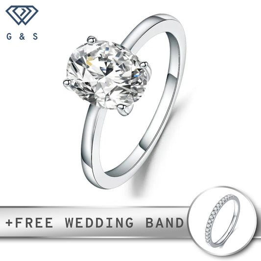 A timeless engagement ring featuring a brilliant 2.00ct oval-cut moissanite, securely held by four classic prongs on a polished sterling silver band.