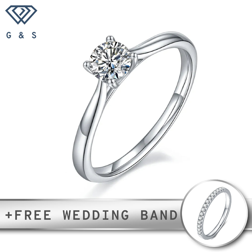 A timeless engagement ring featuring a 0.50ct moissanite held by four prongs.