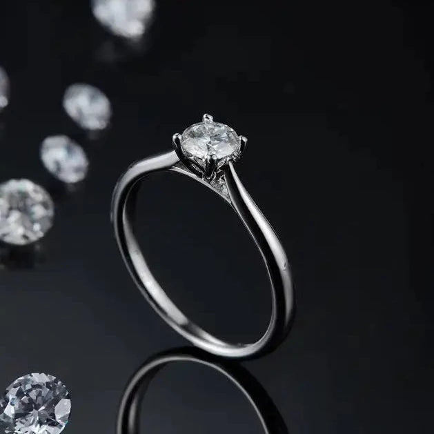 Classic 4-prong setting showcasing a brilliant 0.50-carat moissanite.