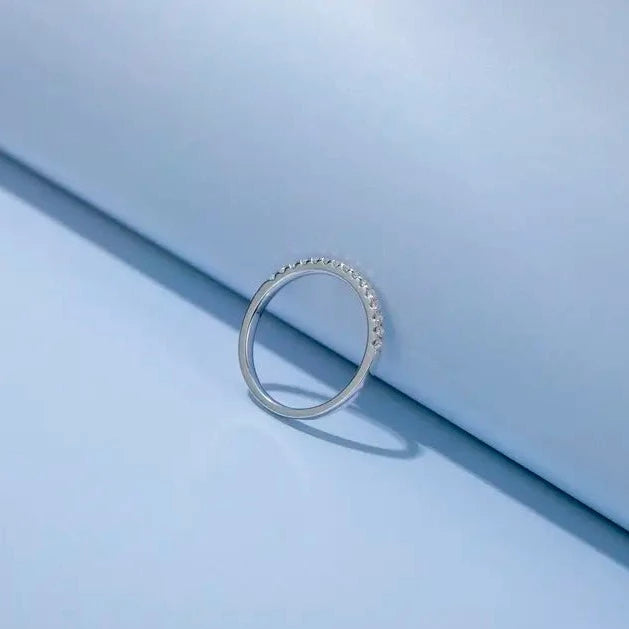 A classic and understated wedding band set perfect for everyday wear, featuring sparkling moissanites in 9ct white gold.