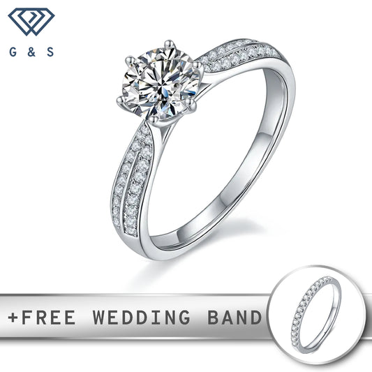 A timeless engagement ring featuring a 1.00ct moissanite center stone, surrounded by a delicate pave setting of smaller moissanites, all crafted in polished sterling silver.