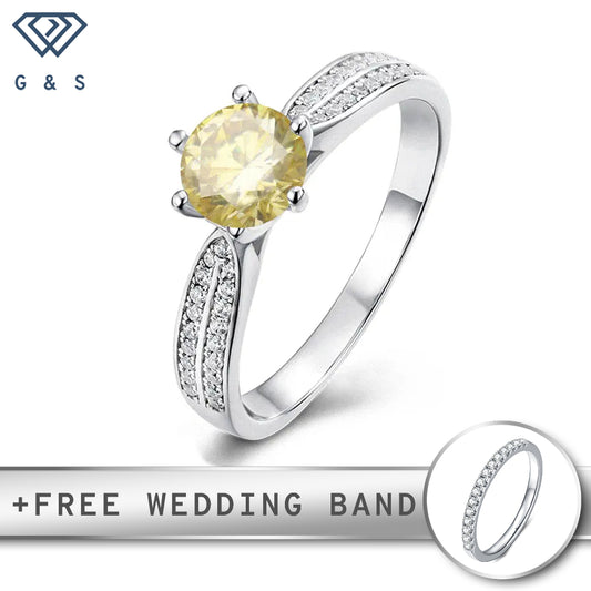 A delicate sterling silver engagement ring featuring a 1.00ct yellow moissanite center stone surrounded by a classic pave setting of small, sparkling stones.