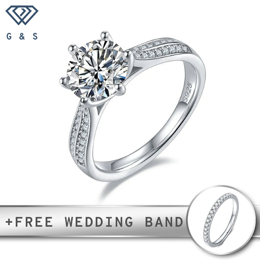  A brilliant 2.00ct moissanite center stone surrounded by a delicate pave setting of smaller moissanites, all set in polished sterling silver.