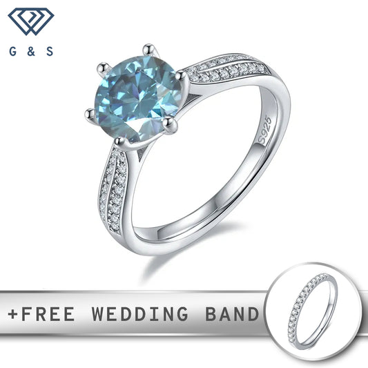 A stunning engagement ring featuring a vibrant 2.00ct blue moissanite, surrounded by a delicate pave setting of smaller stones, all crafted in polished sterling silver.