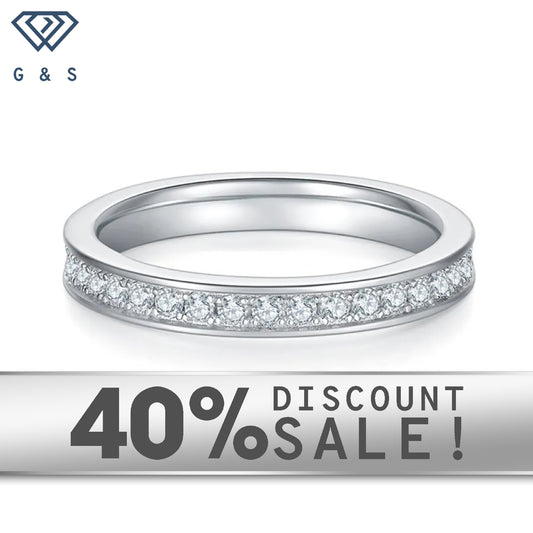 A timeless stacking ring featuring sparkling moissanites pavé-set around the entire band.