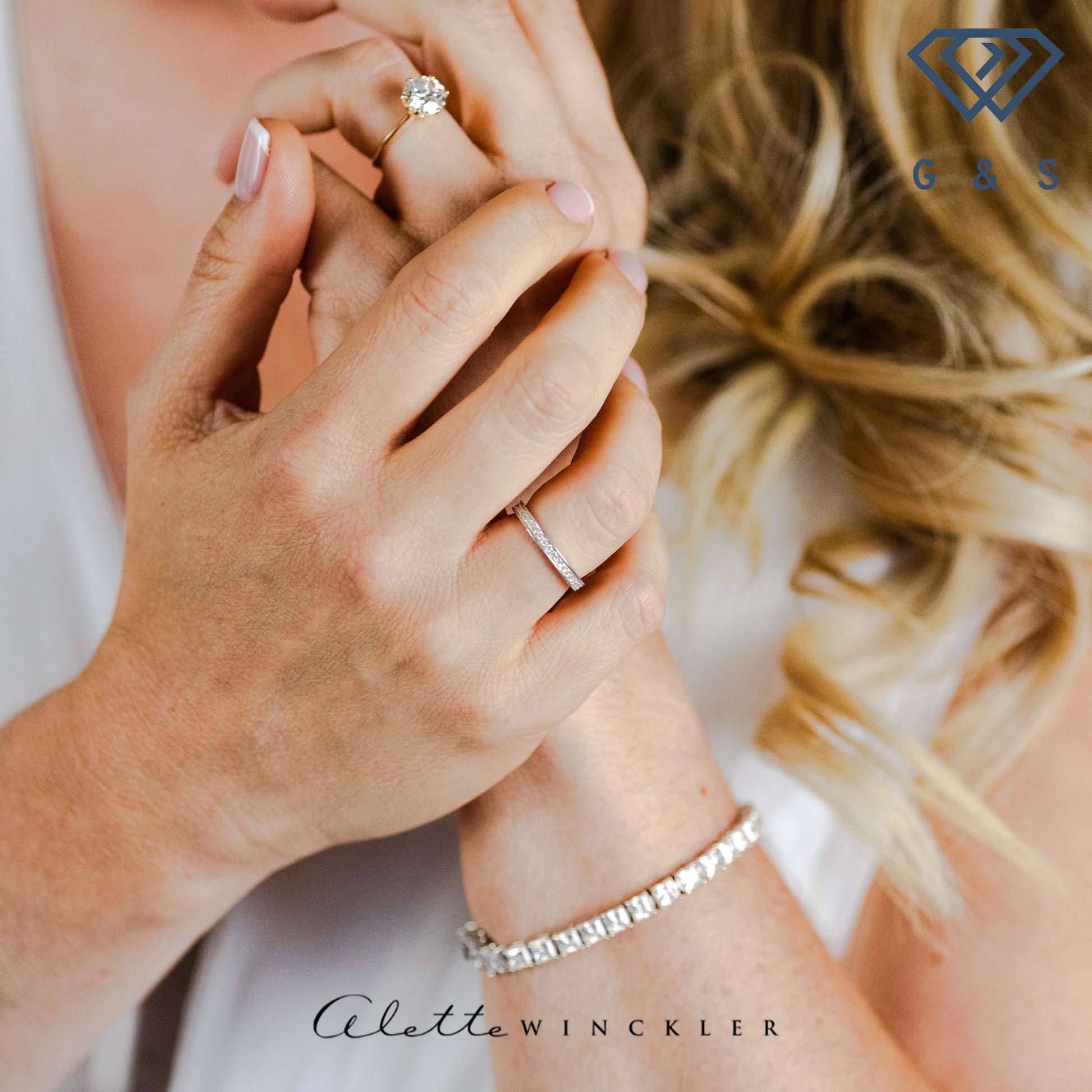 This ring showcases brilliant moissanites set in a continuous pavé style, perfect for stacking or wearing alone.