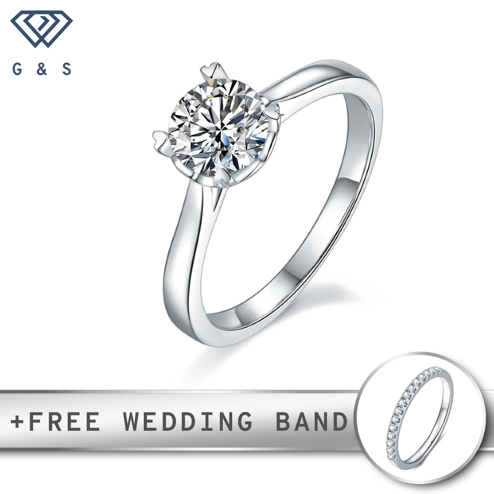 A timeless sterling silver engagement ring featuring a brilliant 1.00ct moissanite held by unique heart-shaped claws.